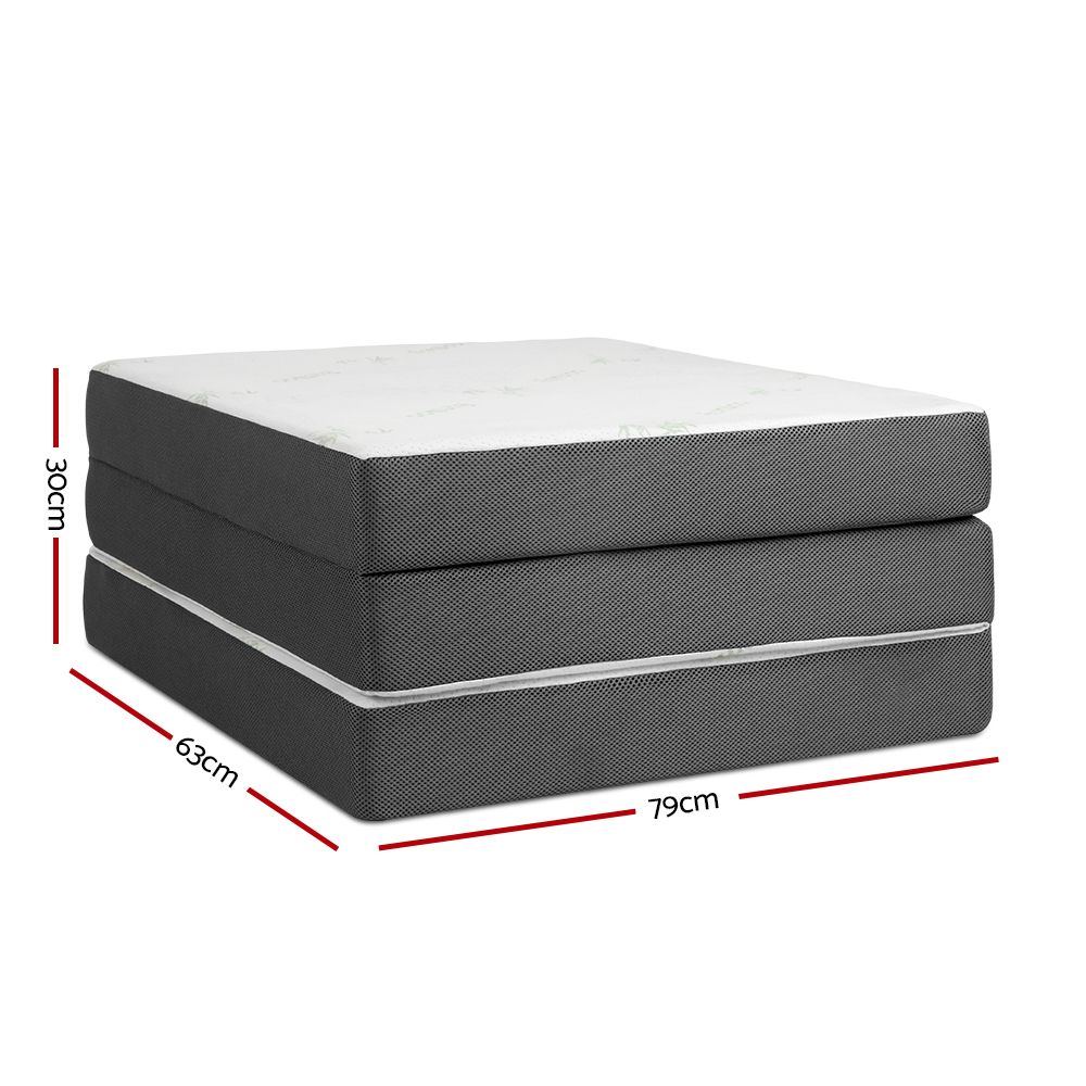 Stacked foldable mattress with two dark gray layers and white top surface