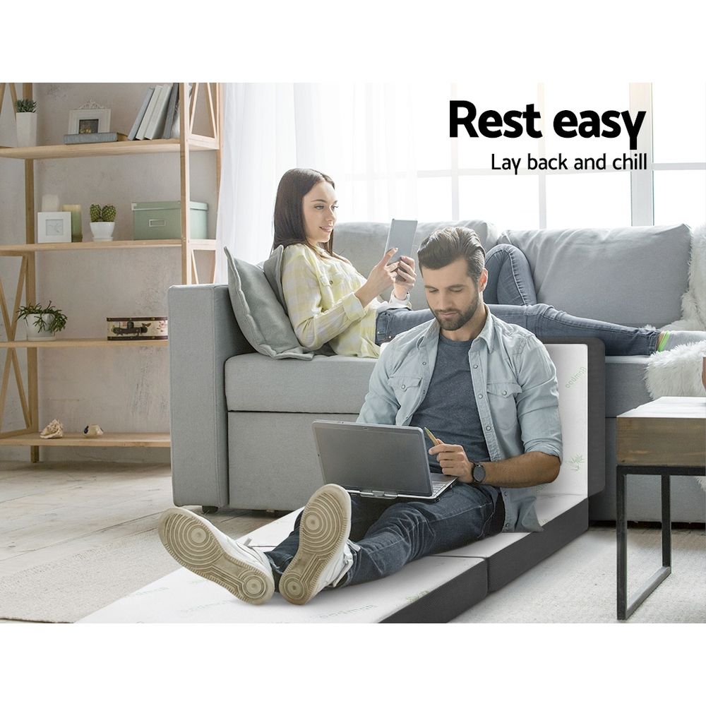 Foldable single mattress laid on sofa with bamboo-print white top