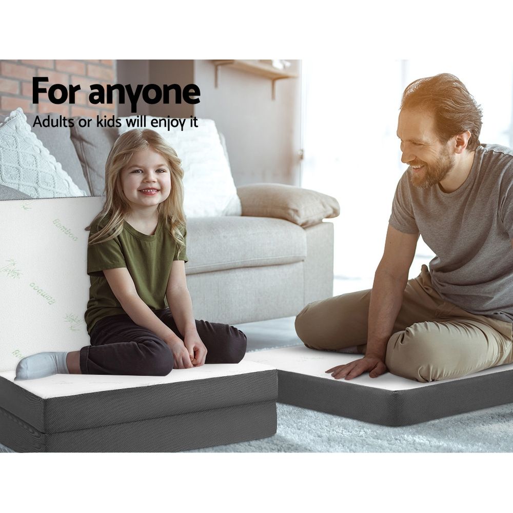 Foldable single mattress with dark gray sides and white bamboo-print top