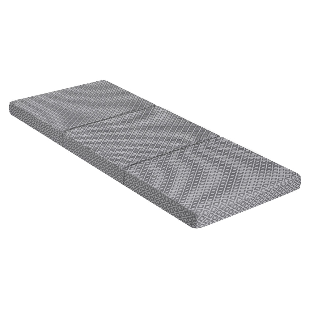 Foldable trifold memory foam mattress with gray geometric fabric cover, folded