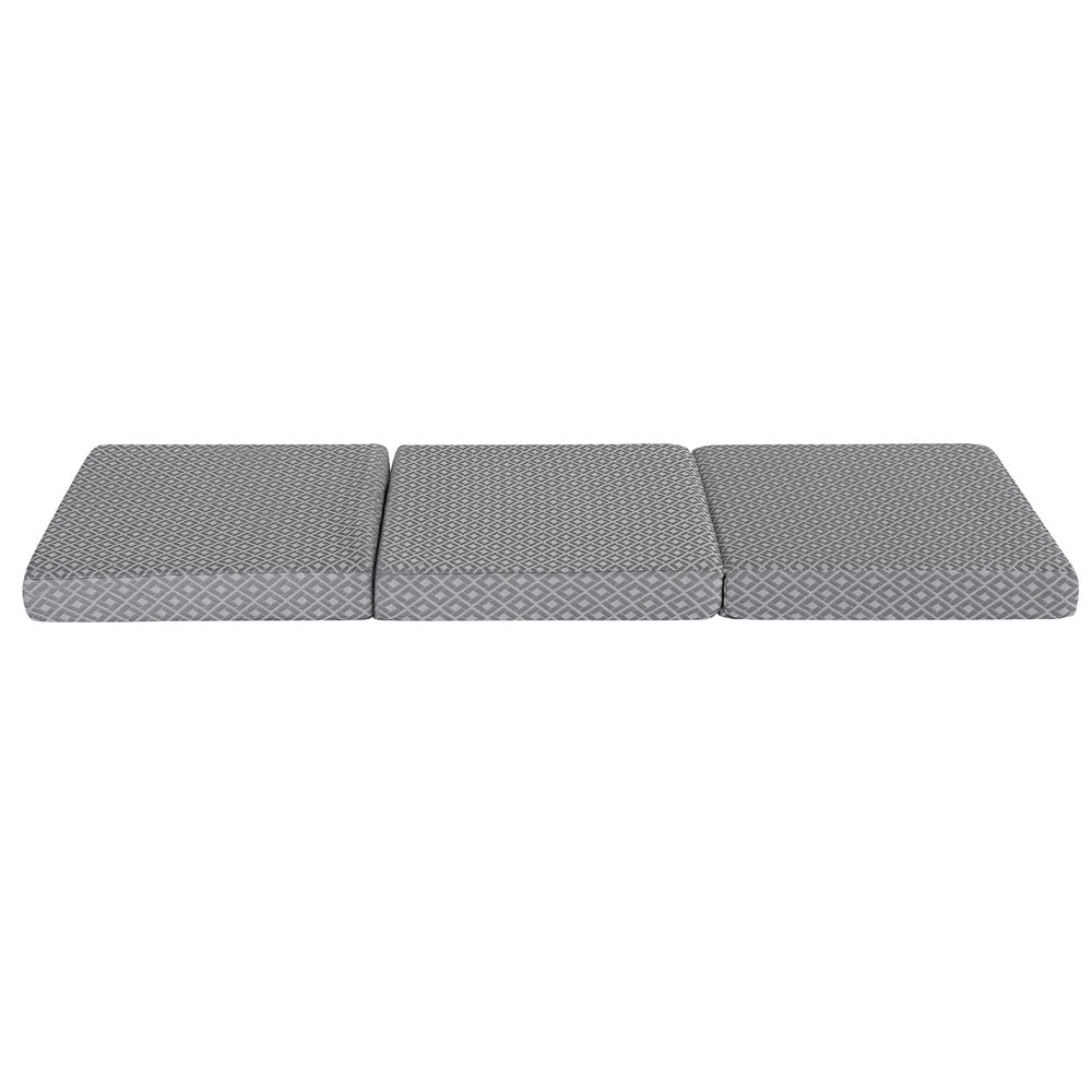Foldable trifold memory foam mattress with gray geometric cover in three sections