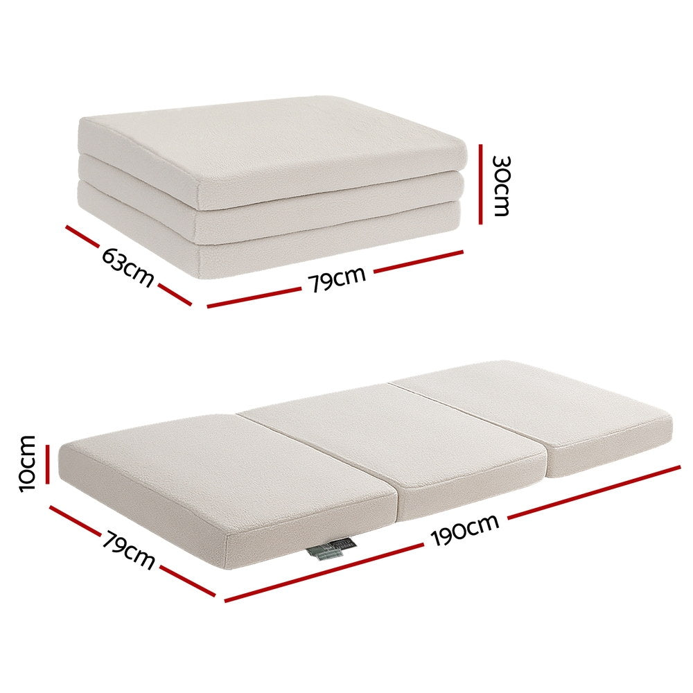 3-fold foam mattress with light beige top and side panels in a folded stacked view.