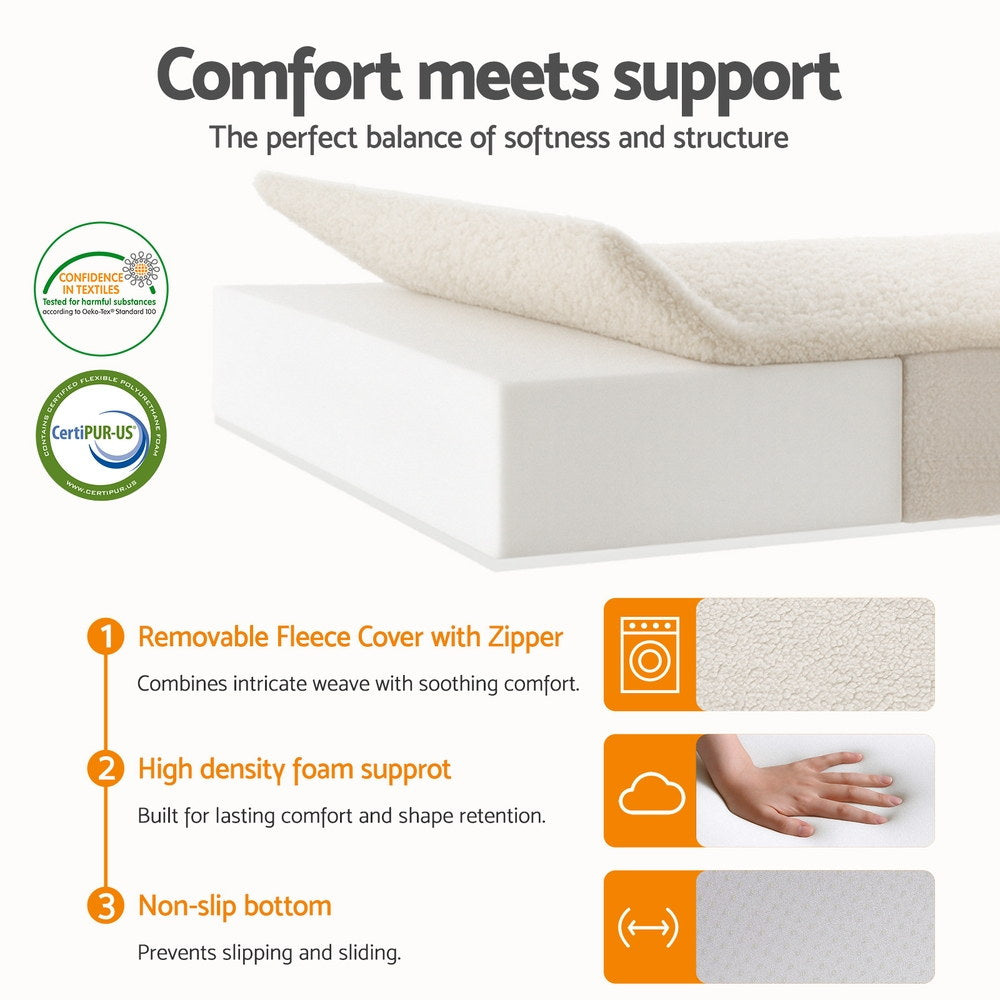 Foldable 3-panel foam mattress with light beige fleece cover and smooth, stitched edges.