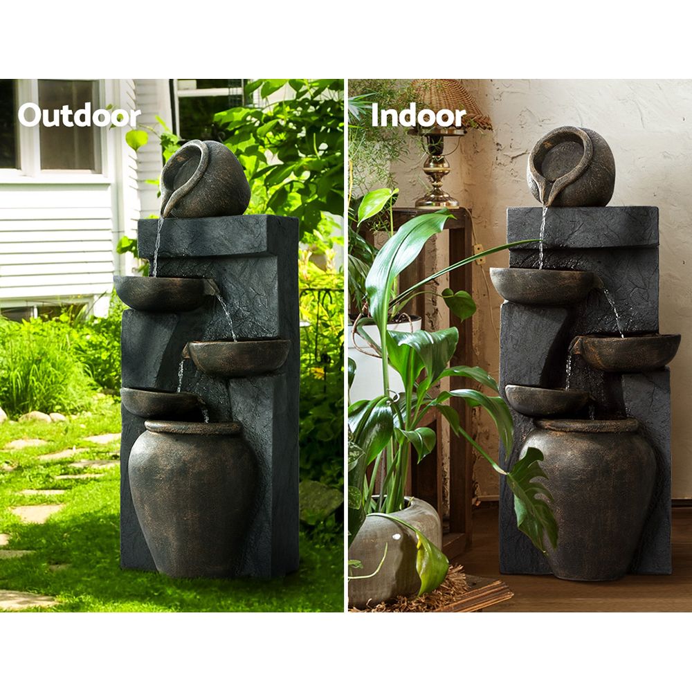 5-tier cascading water fountain with dark stone tiers and water flowing between bowls