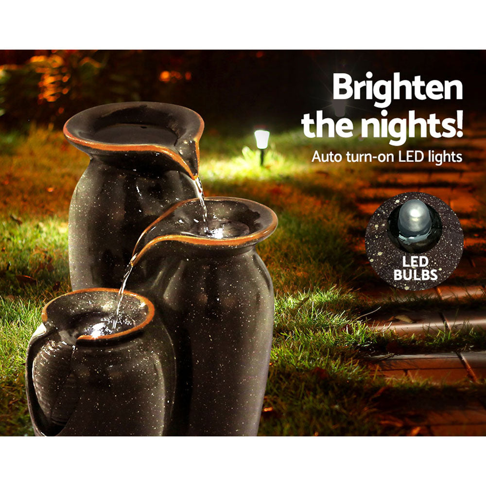 Grey resin three-urn fountain with LED lights and recirculating water stream