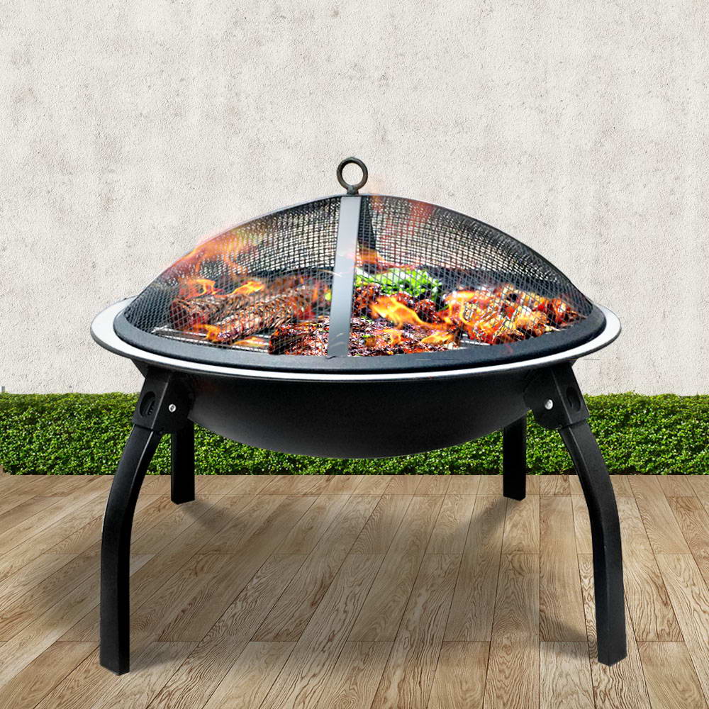 Portable charcoal BBQ fire pit with mesh dome, round bowl, and three legs
