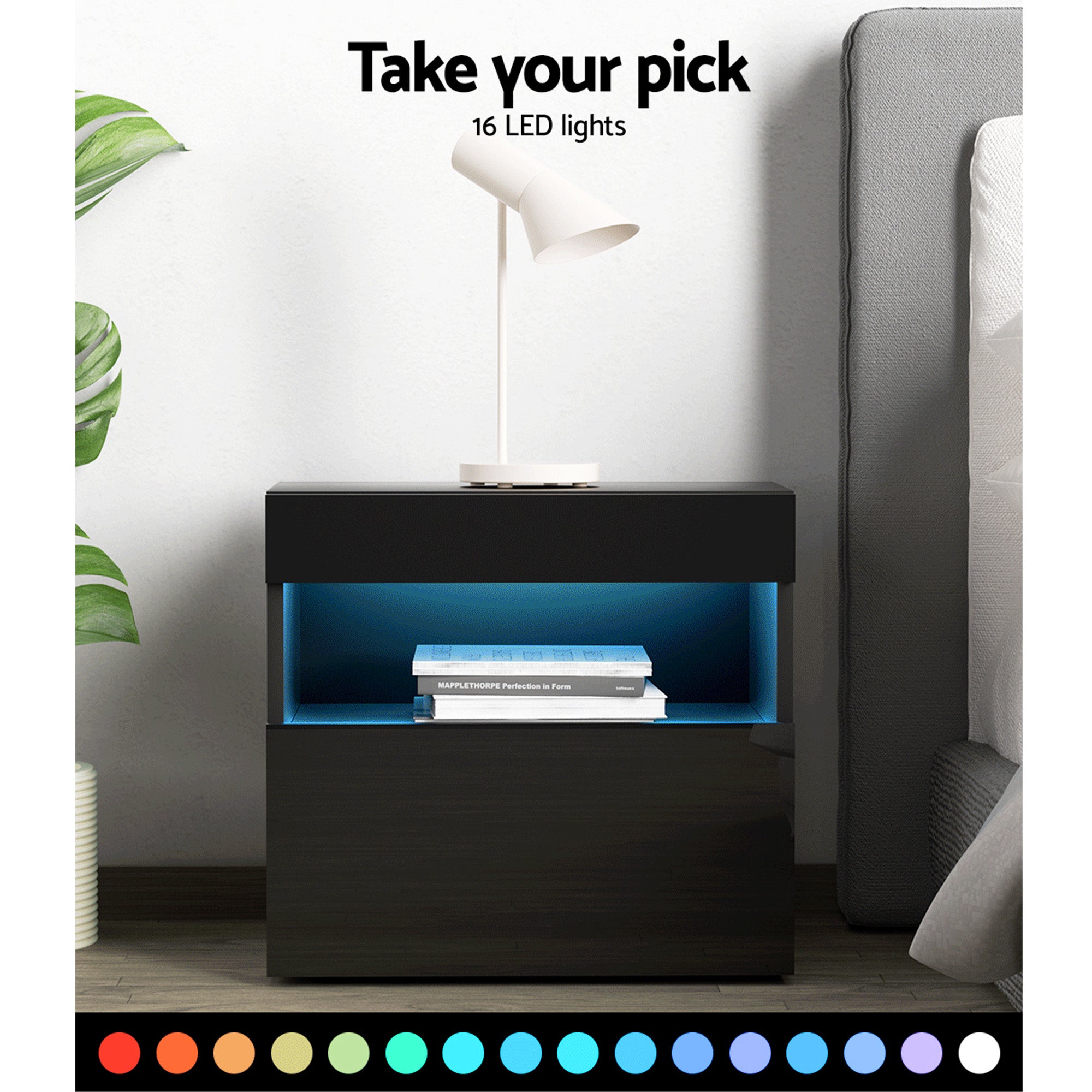 Black LED bedside table with blue-lit open shelf and white lamp on top