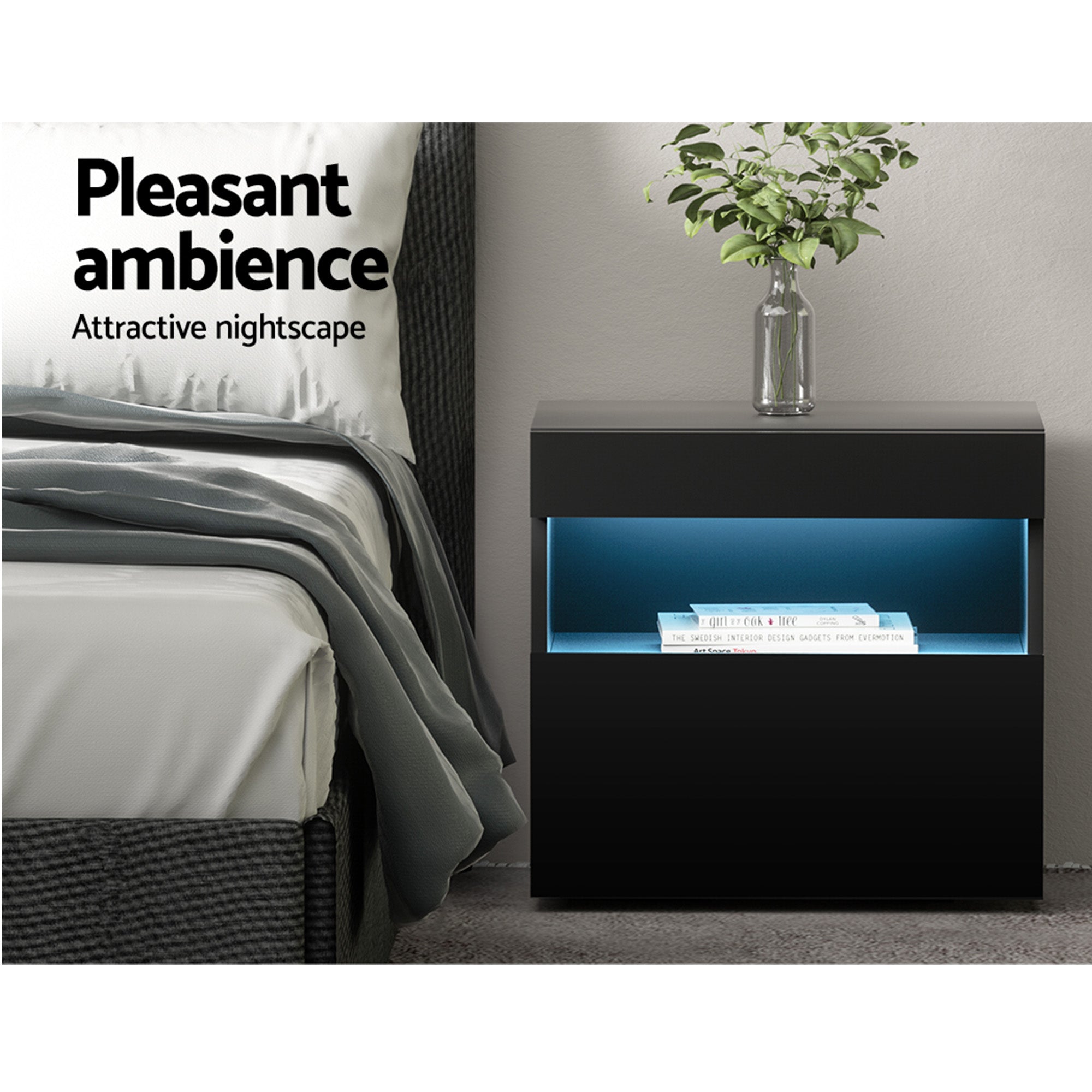 Black LED bedside table with blue-lit open shelf beside a bed