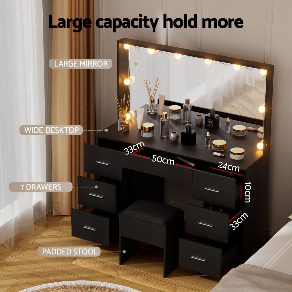 Dressing table vanity with large mirror and multiple drawers, padded stool