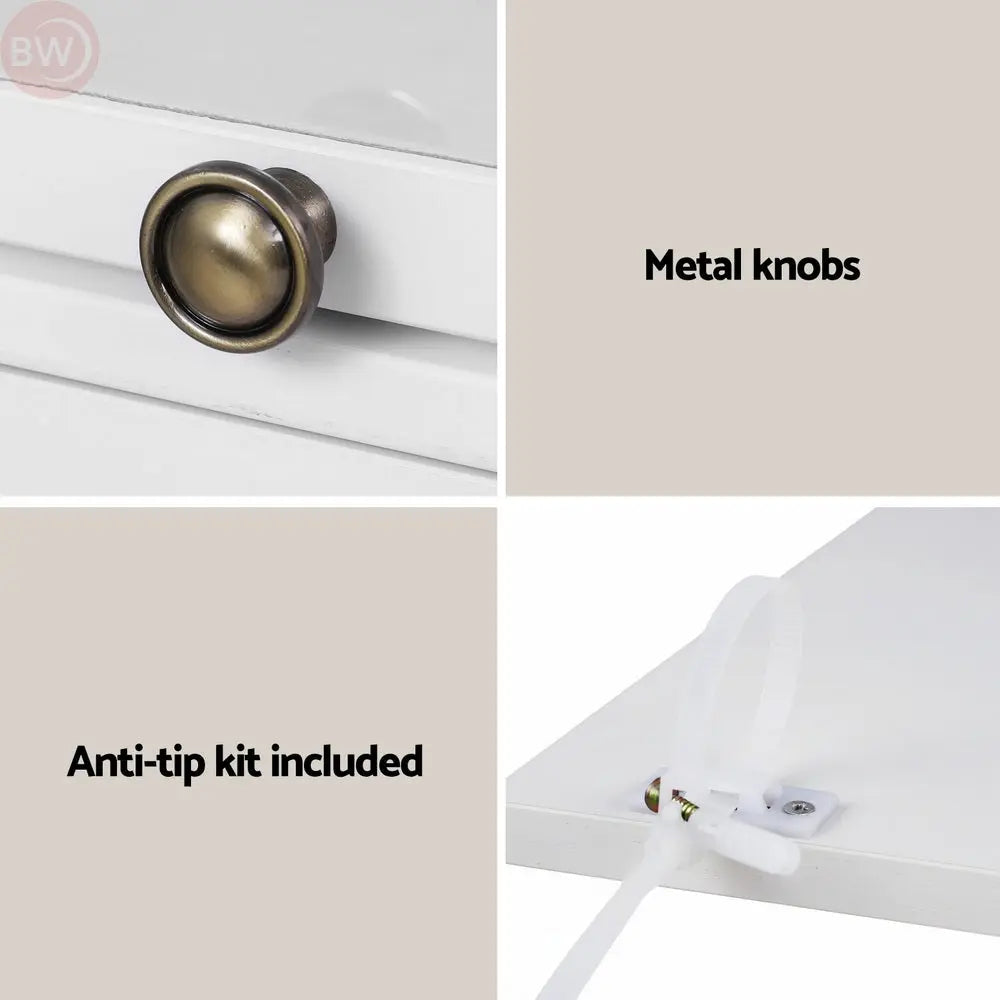 White cabinet with round metal knobs and included anti-tip kit