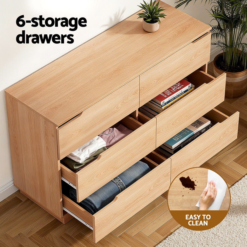 Light pine dresser with open top drawers and side compartments, black bar handles