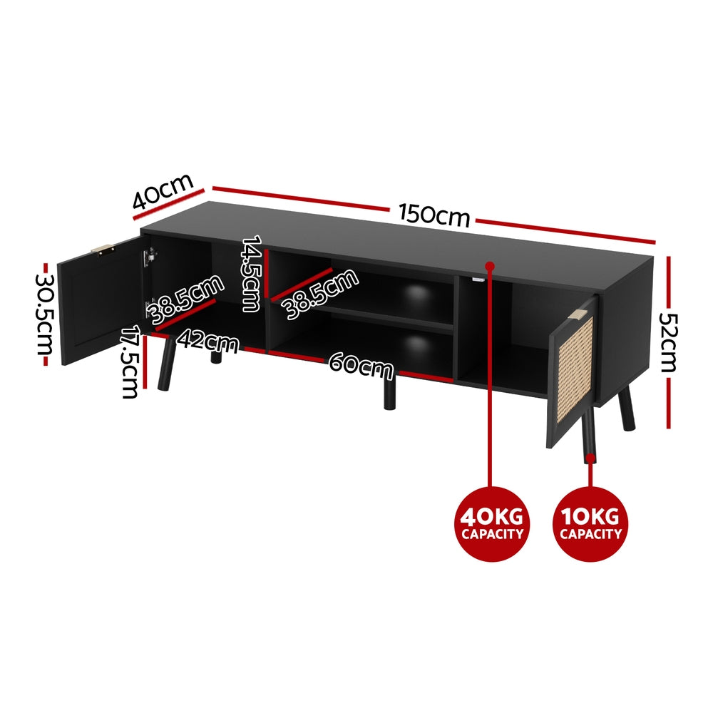 Black TV cabinet with open shelves, two rattan-look drawers, and four legs