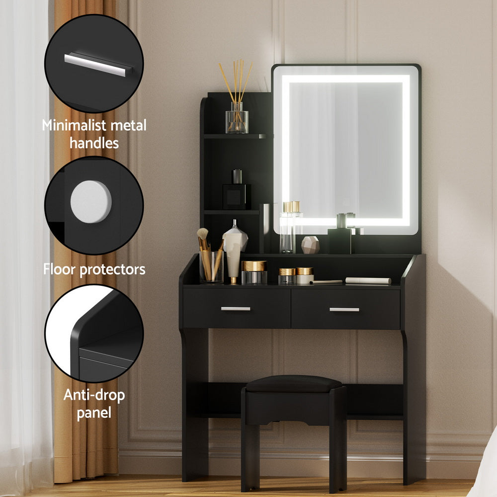 Black dressing table with LED mirror, drawers, and cushioned stool