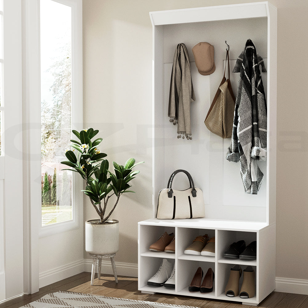 White hall tree with coat hooks, bench seat, and open cubby shoe storage