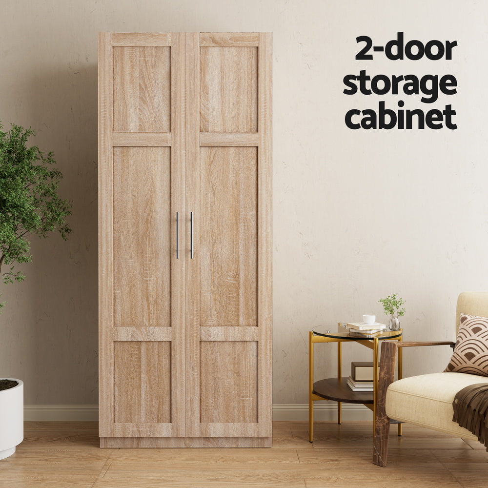 Two-door storage cabinet in light oak with vertical panel doors and long silver handles