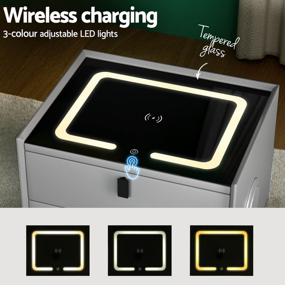 Grey bedside table with wireless charging pad and glowing LED light border