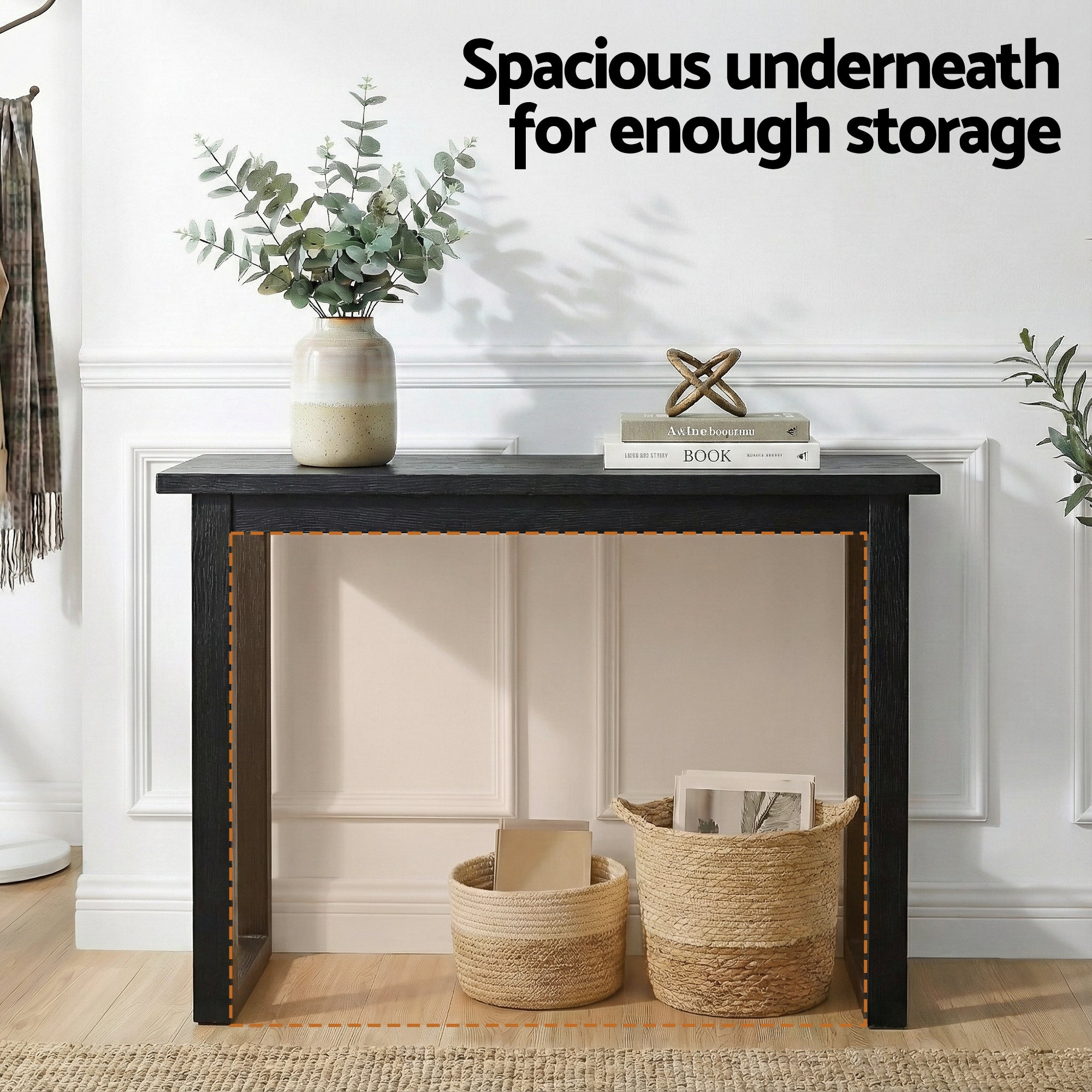 Black console table with open underside for storage and a flat top surface.