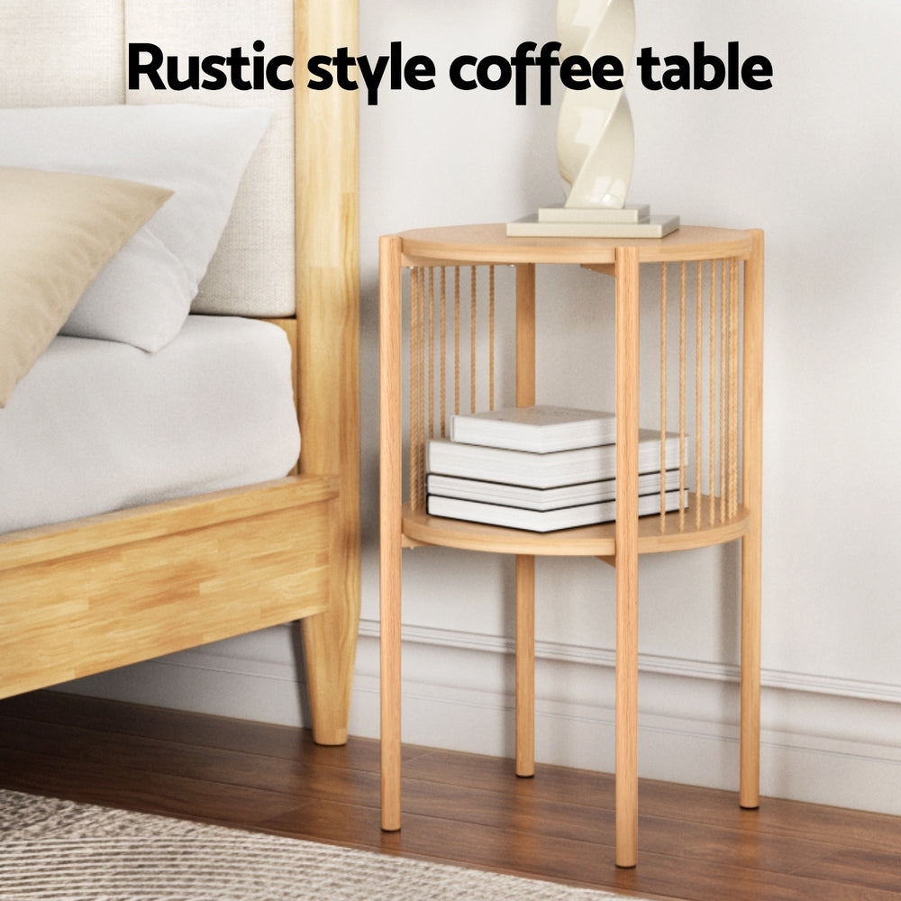 2-tier round wood coffee table with slatted sides and storage shelf