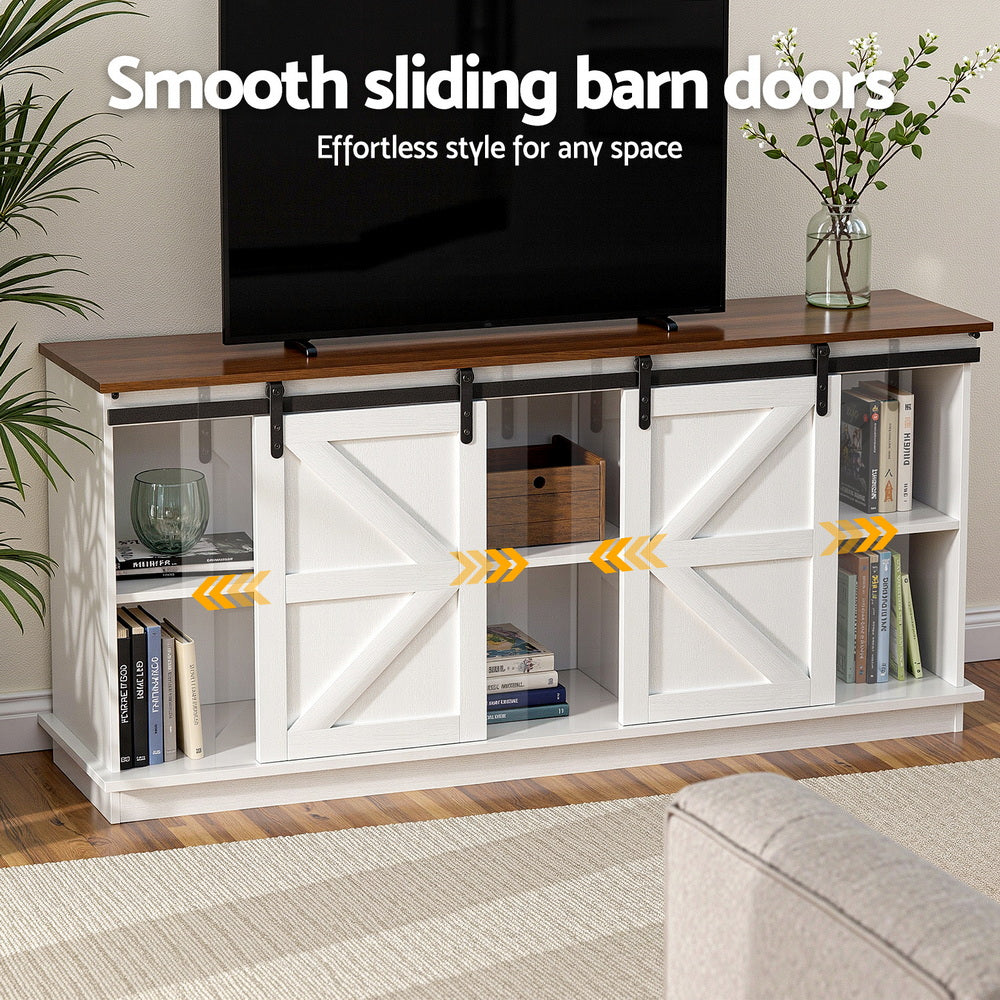 White sideboard with sliding barn doors and brown top, with items on open shelves
