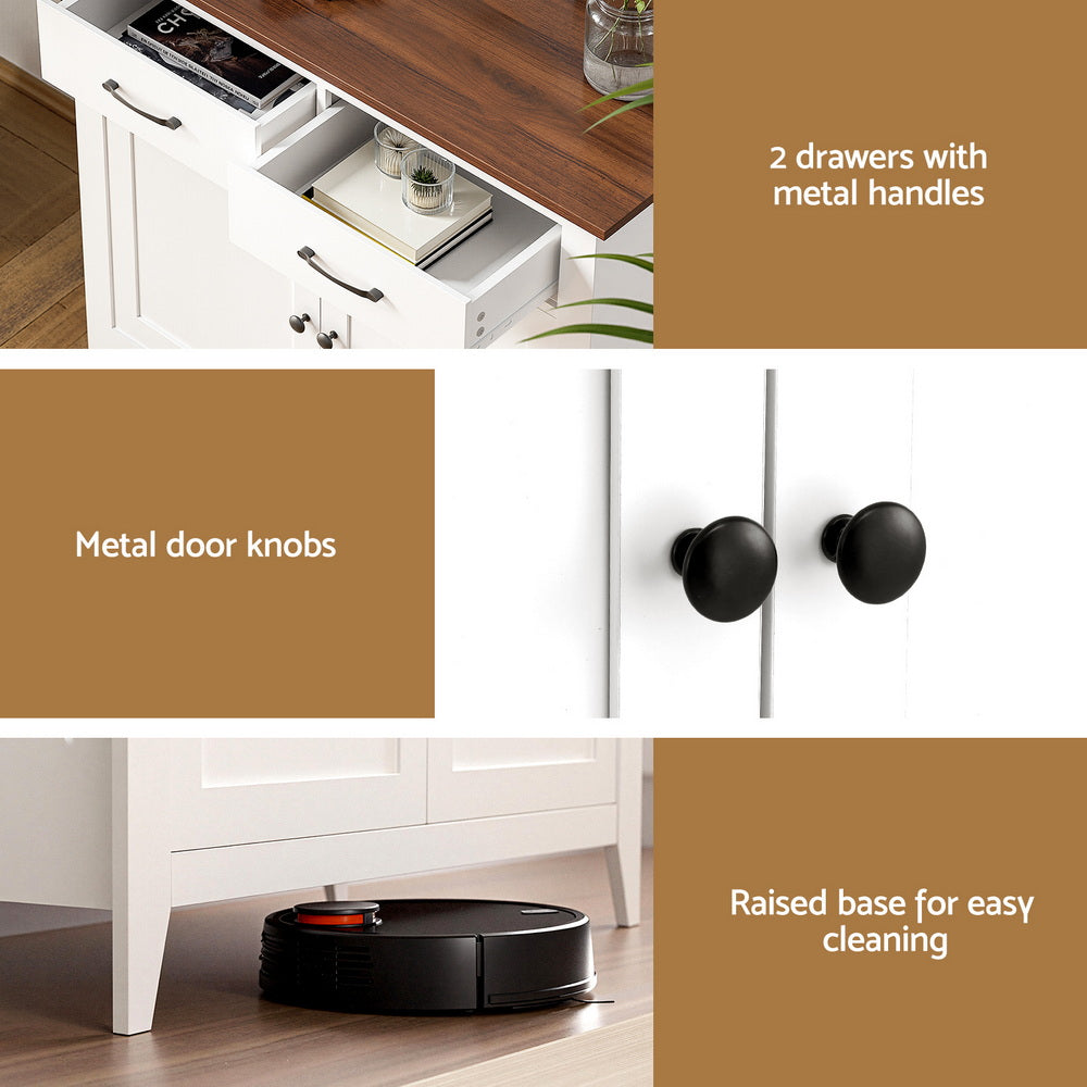 White sideboard with metal drawer handles, round door knobs, and raised base