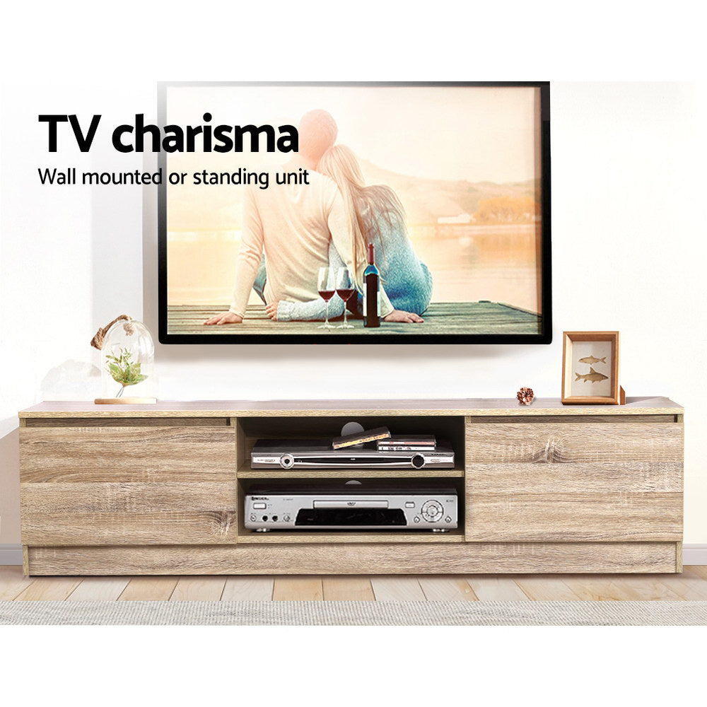 TV cabinet with central media opening and side storage drawers in light pine wood finish.
