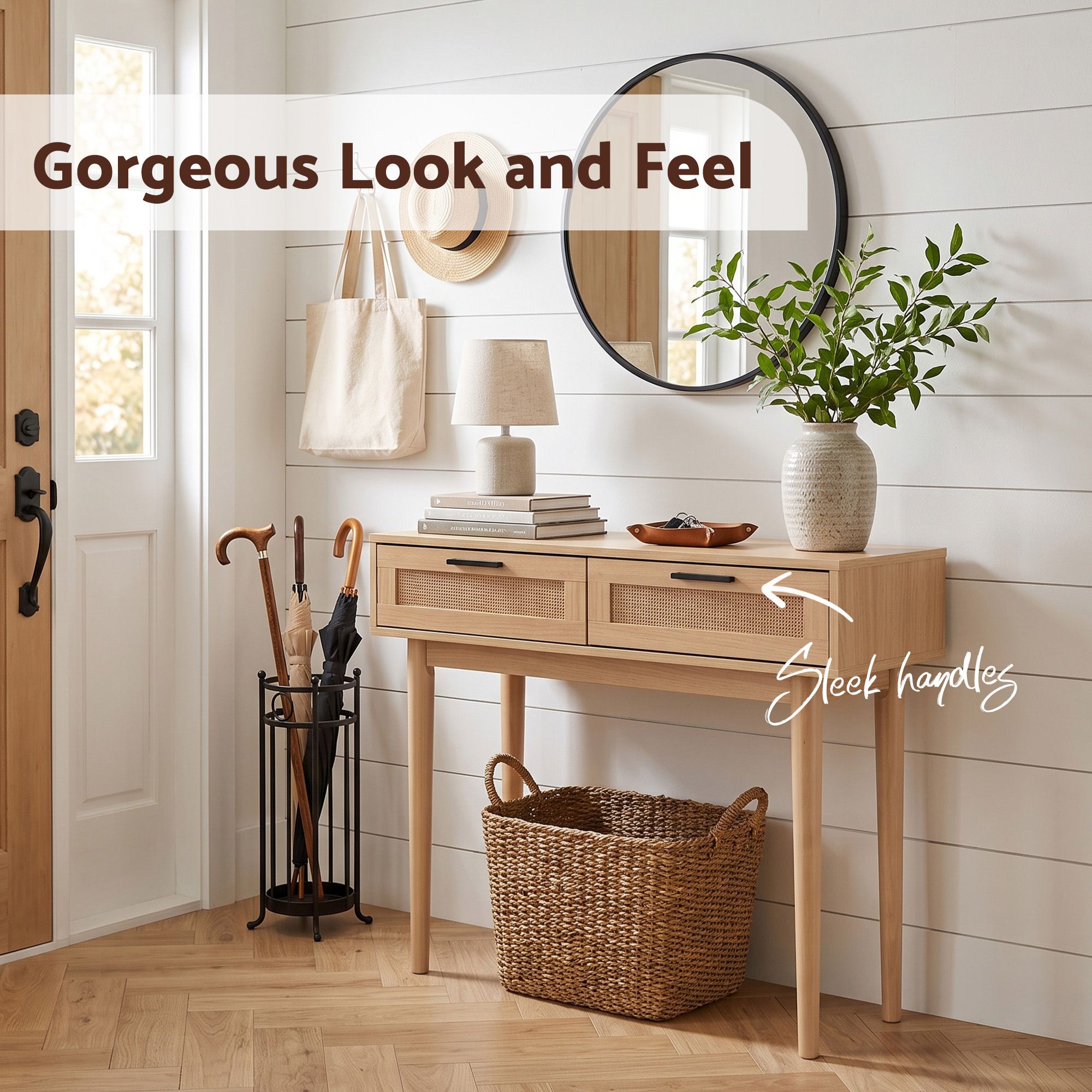 Light wood console table with two rattan drawer fronts and black bar handles