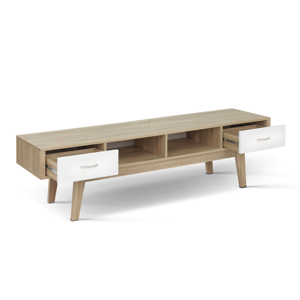 Oak TV cabinet with open cubbies, two white drawers, and four tapered legs