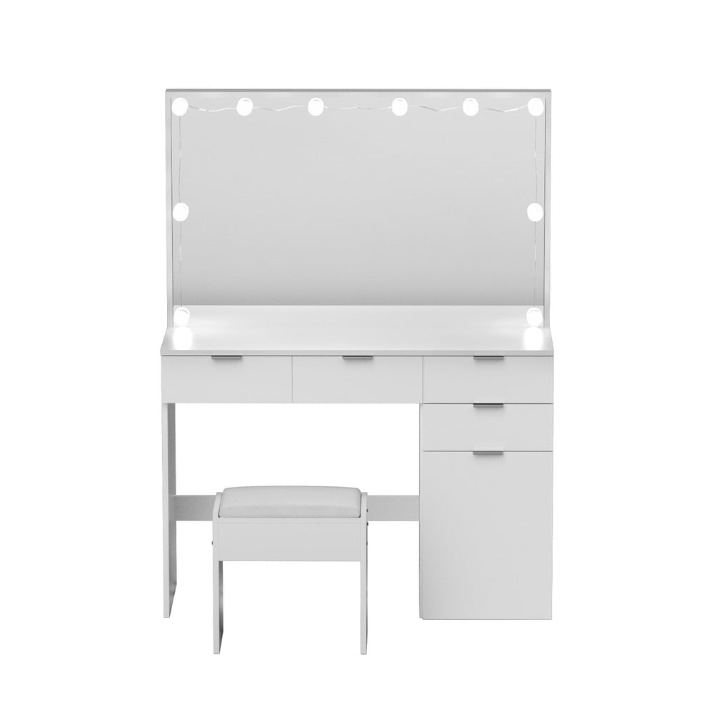 White dressing table with mirror, drawers, and matching padded stool