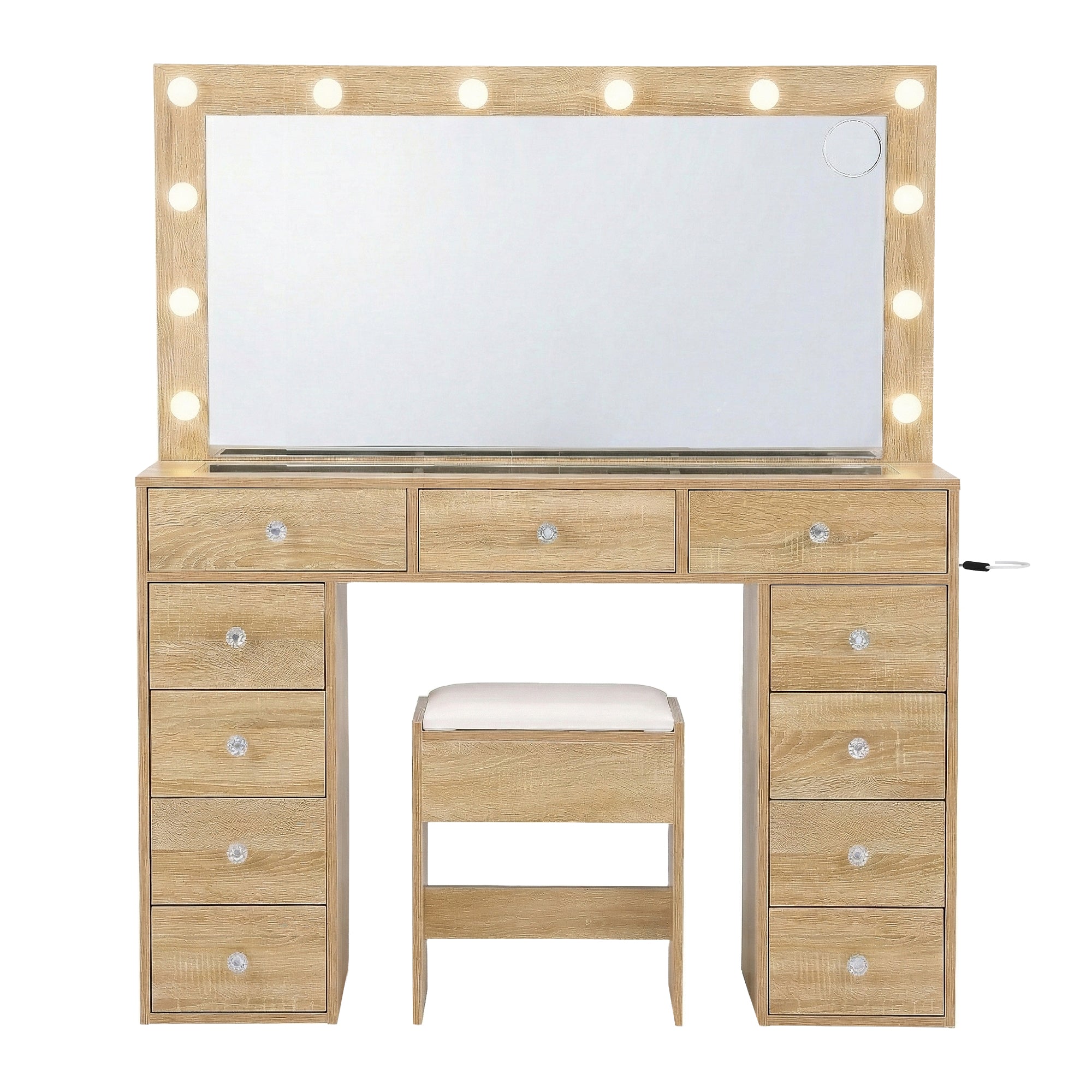 Wooden vanity desk with LED bulbs around mirror and drawers, with padded stool