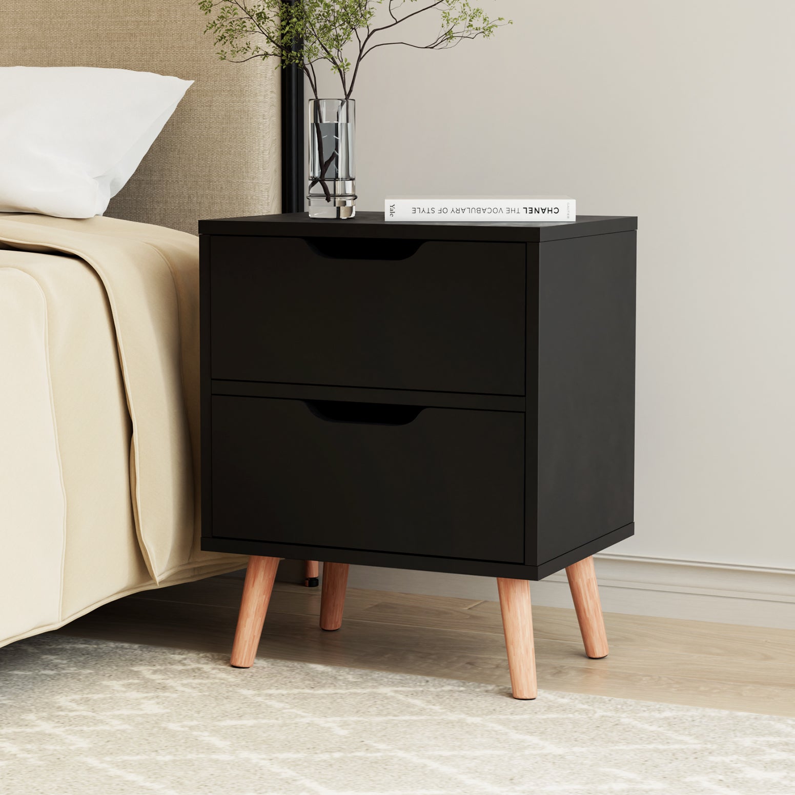 Black bedside table with 2 drawers and tapered wooden legs