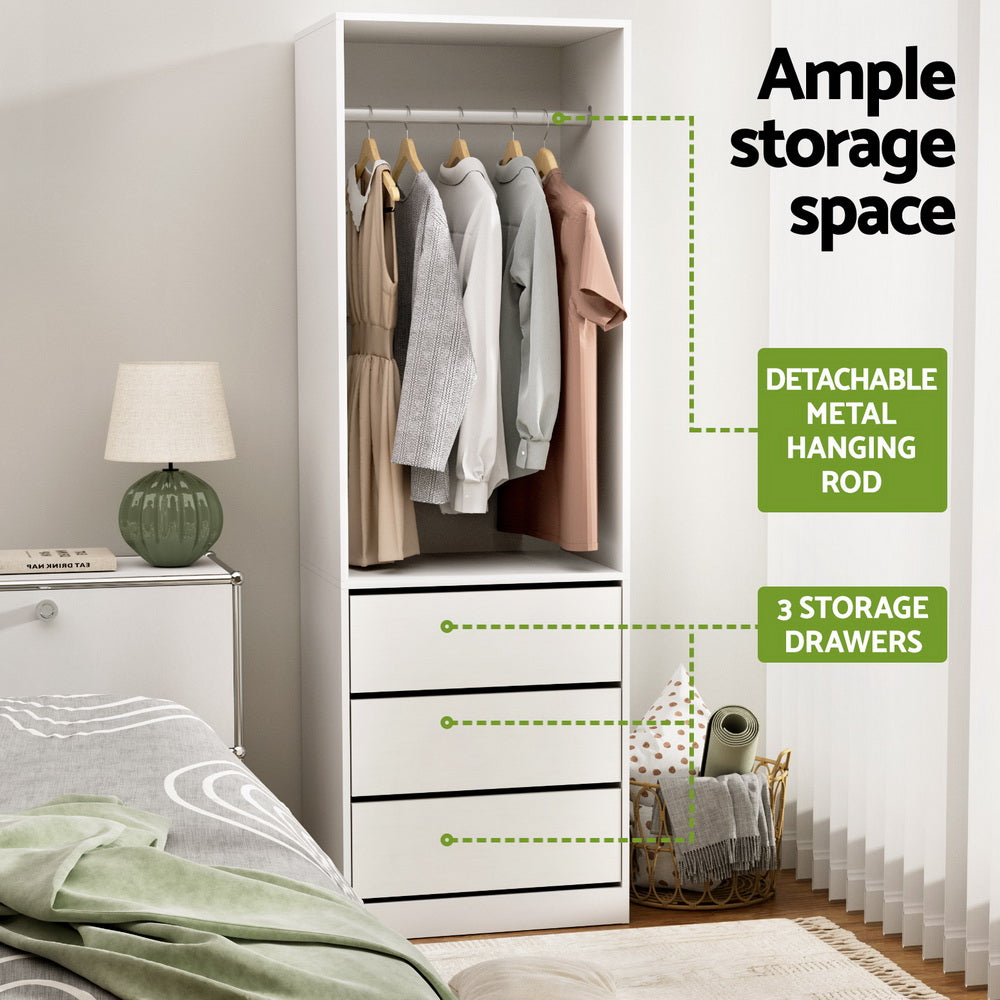 White wardrobe cabinet with hanging rail, open shelves, and three storage drawers
