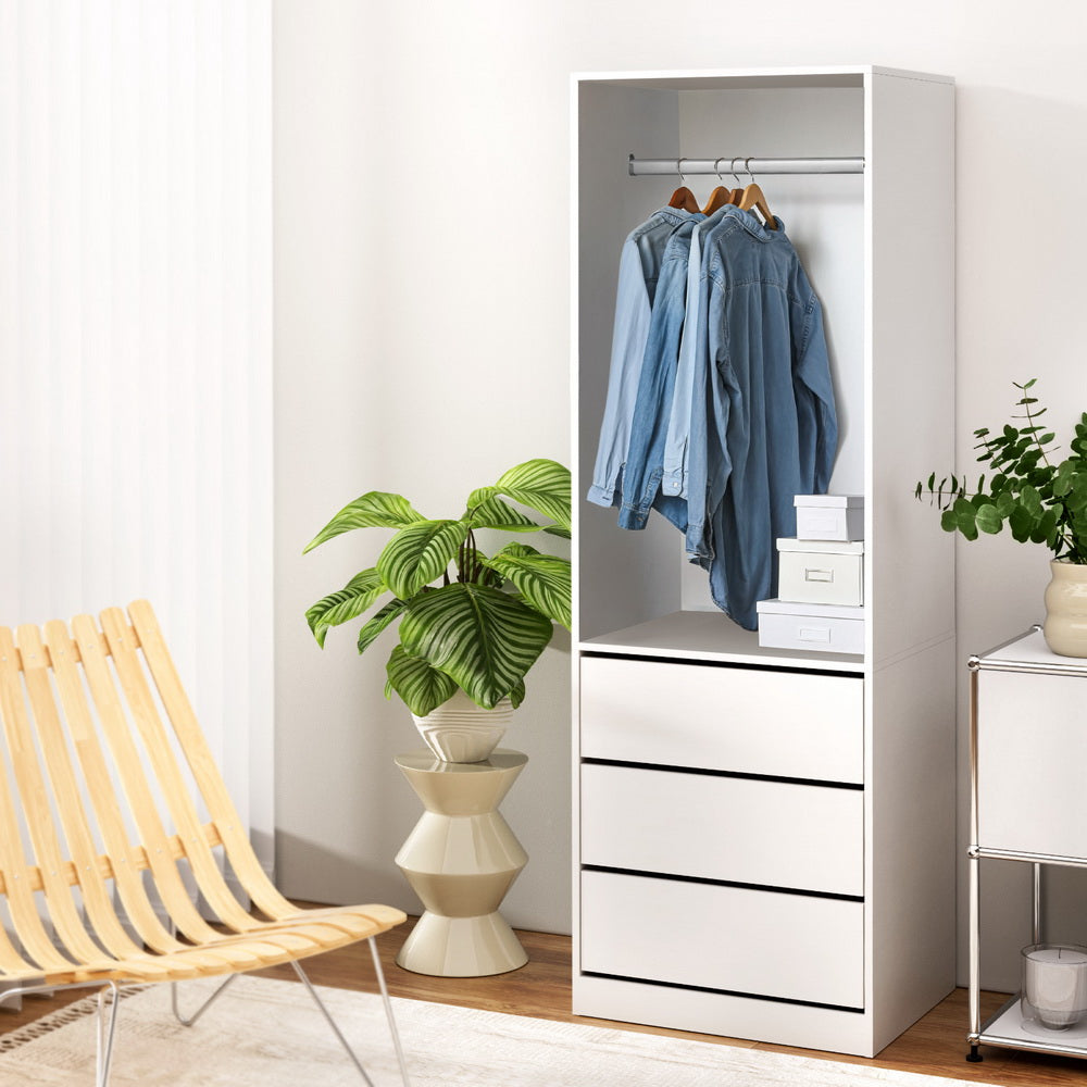 White wardrobe cabinet with hanging rail and three drawer storage drawers