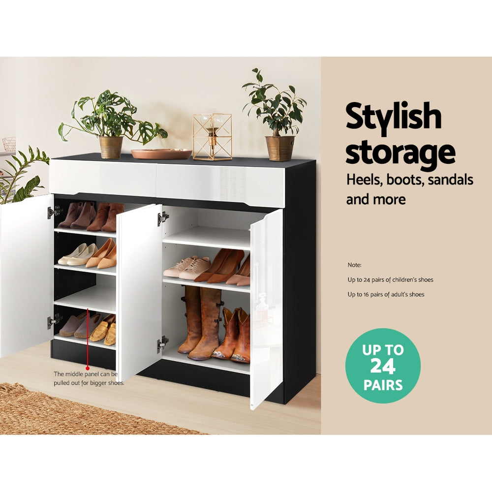 White shoe storage cabinet with drawer, open doors showing shoe shelves