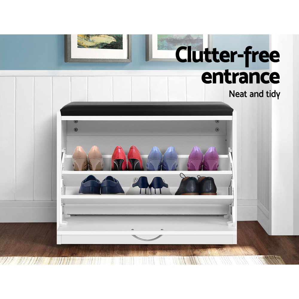 White shoe rack cabinet bench with black top, front shelves holding assorted shoes