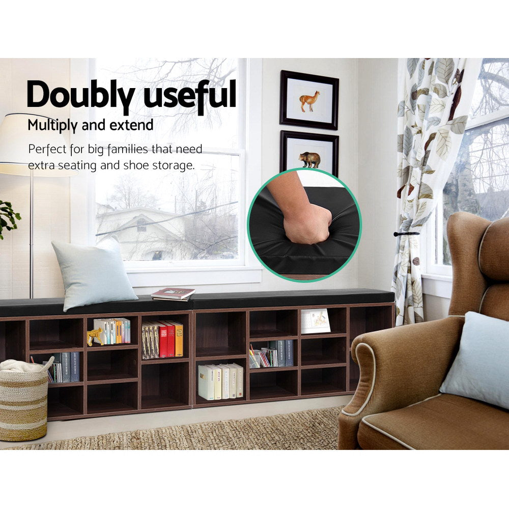 Walnut shoe rack bench with black padded top and open cube shelves for storage