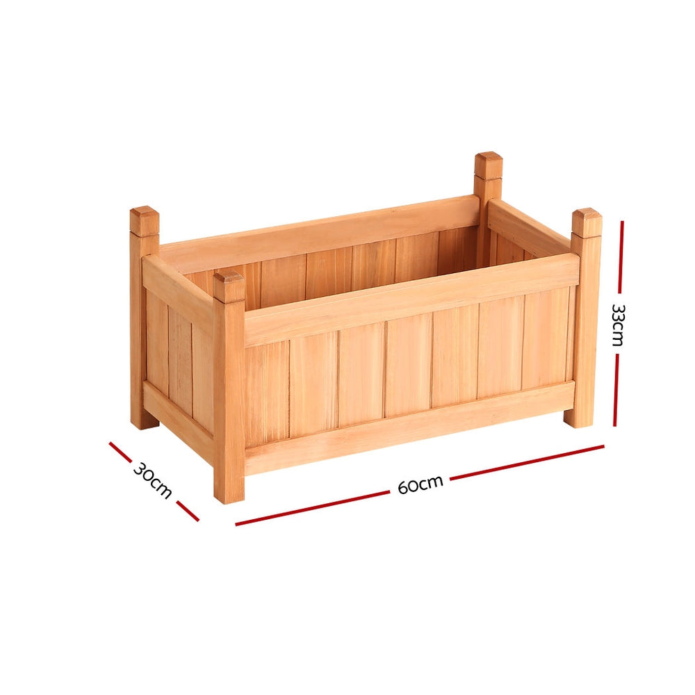 Light wooden raised planter box with four legs, open top, and front rail detail.