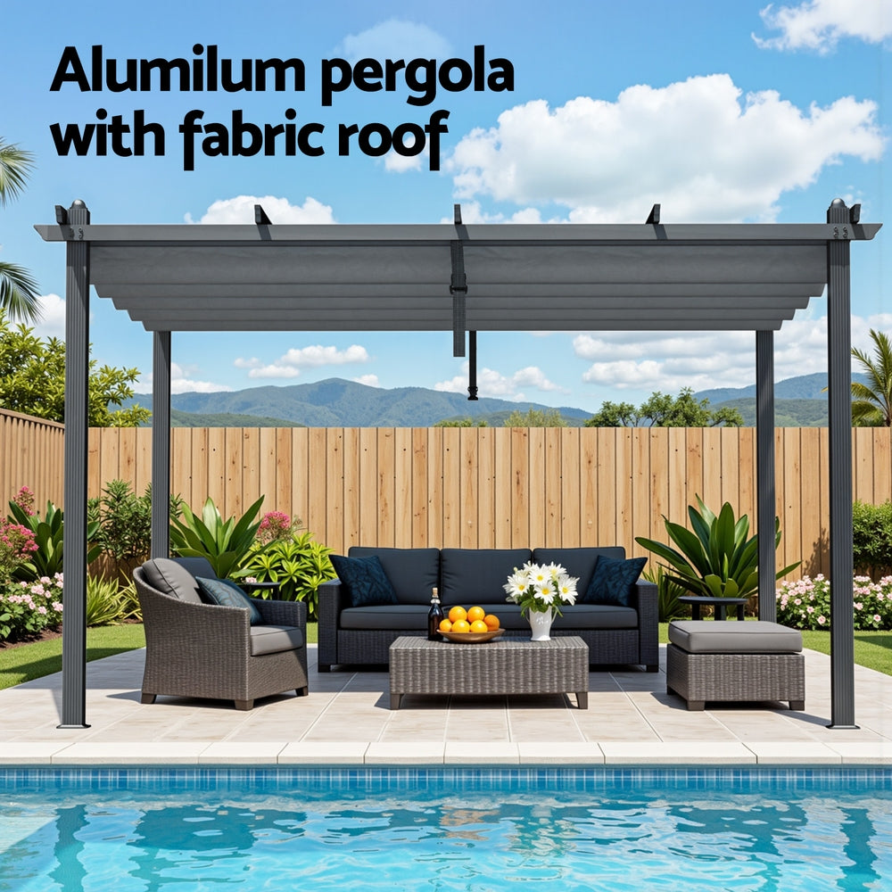Grey aluminium pergola with fabric canopy over patio, four corner posts