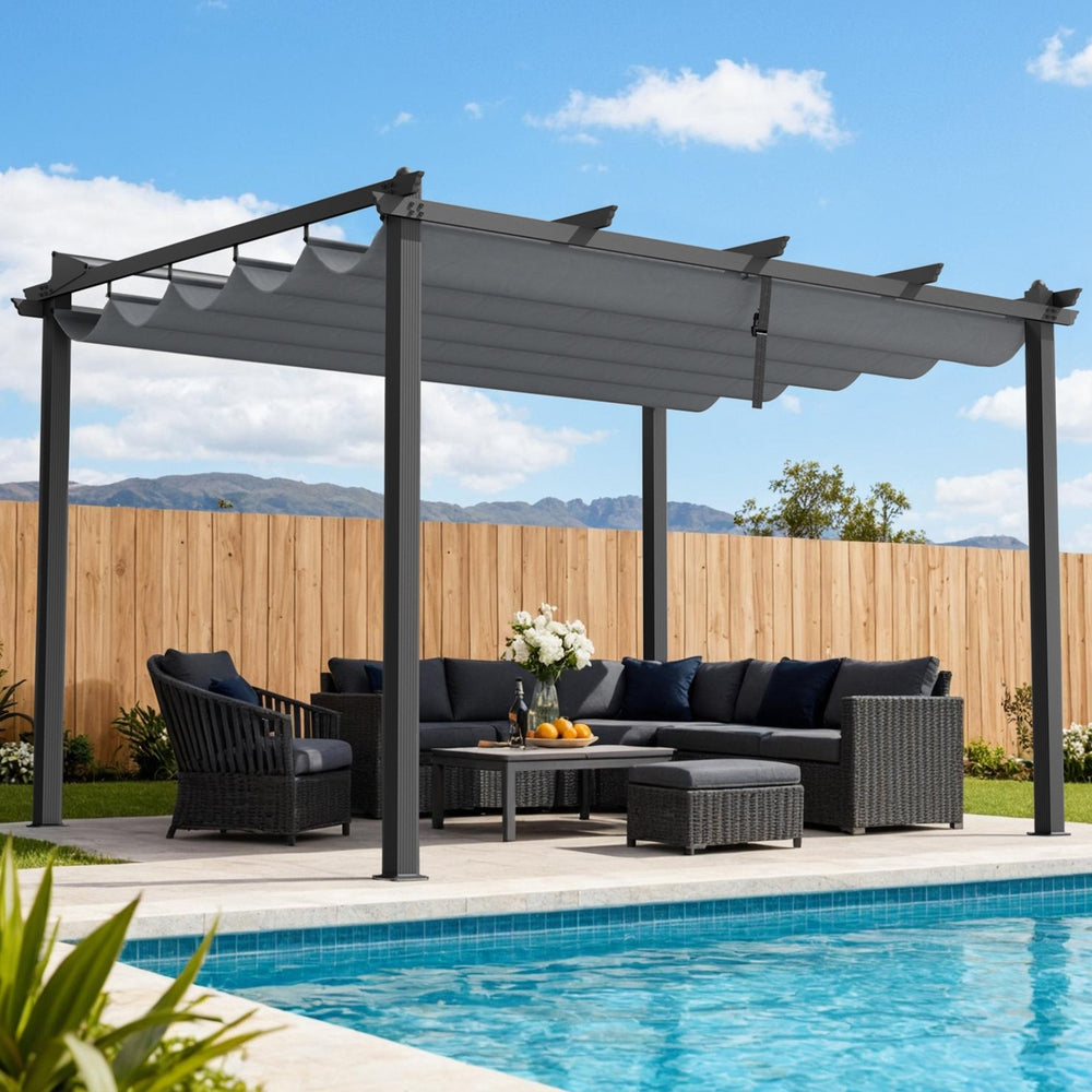 Grey aluminium pergola with adjustable fabric canopy over poolside patio, four posts