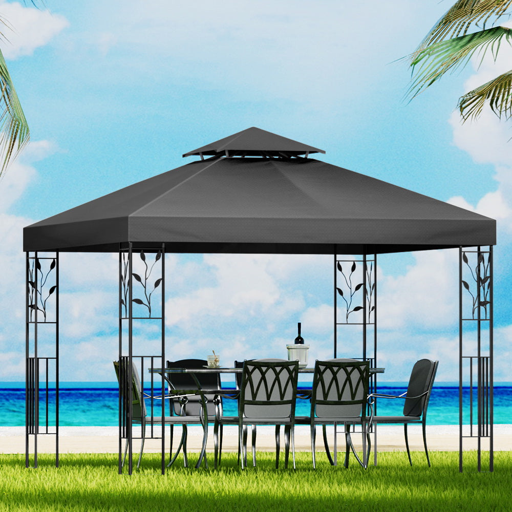 Outdoor gazebo with dark grey canopy and decorative metal panels, viewed from front