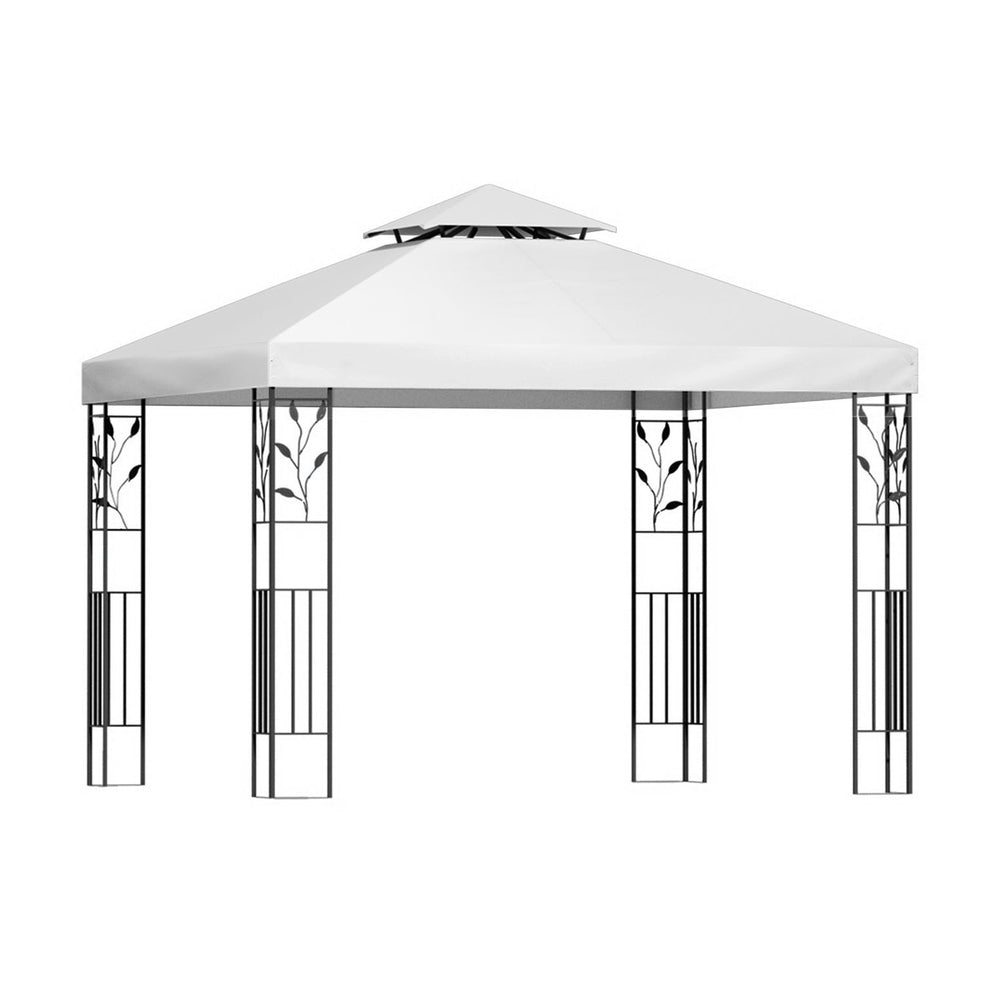 White outdoor gazebo canopy with open iron side panels and floral lattice accents