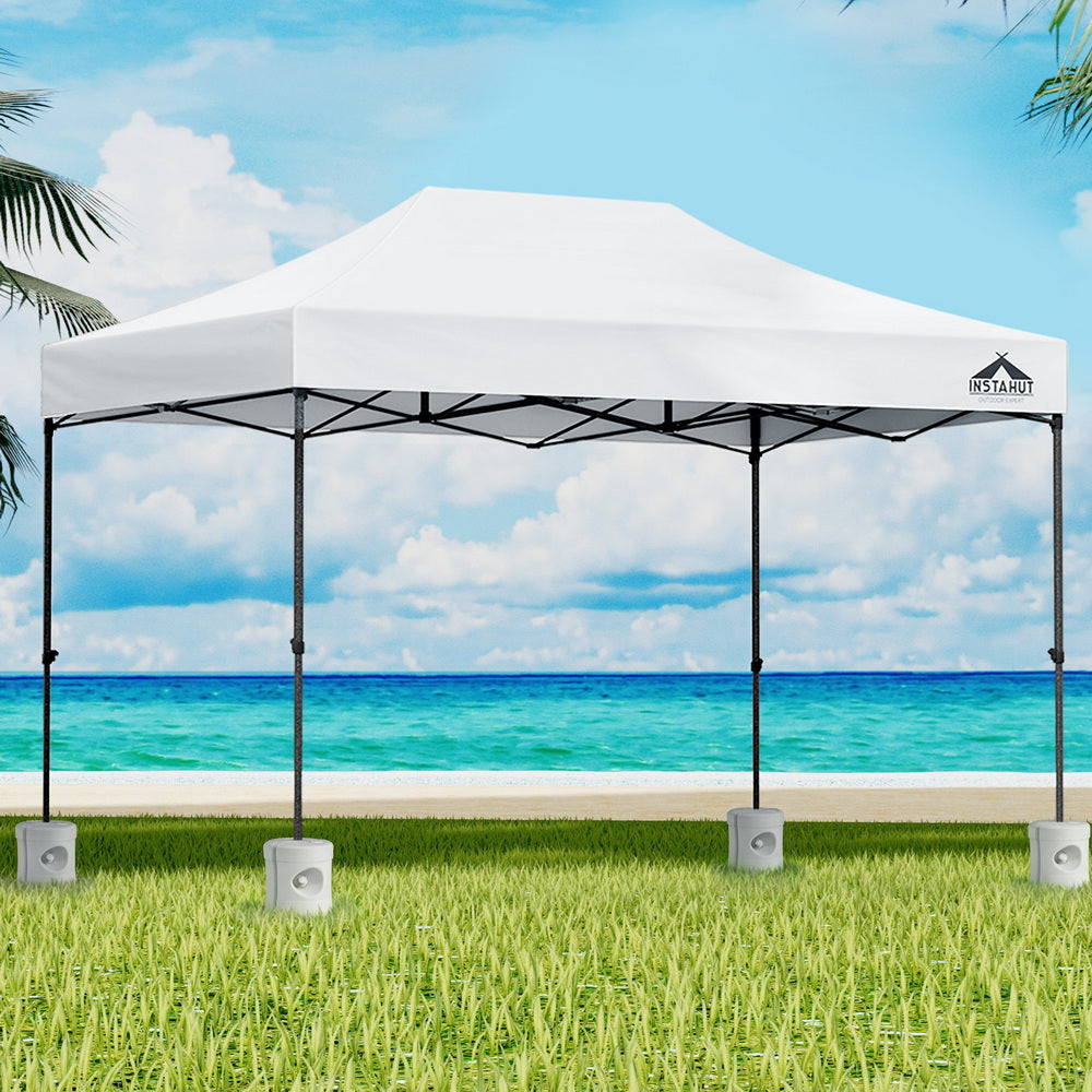 Instahut pop-up gazebo canopy with white roof and black frame, four hanging lights