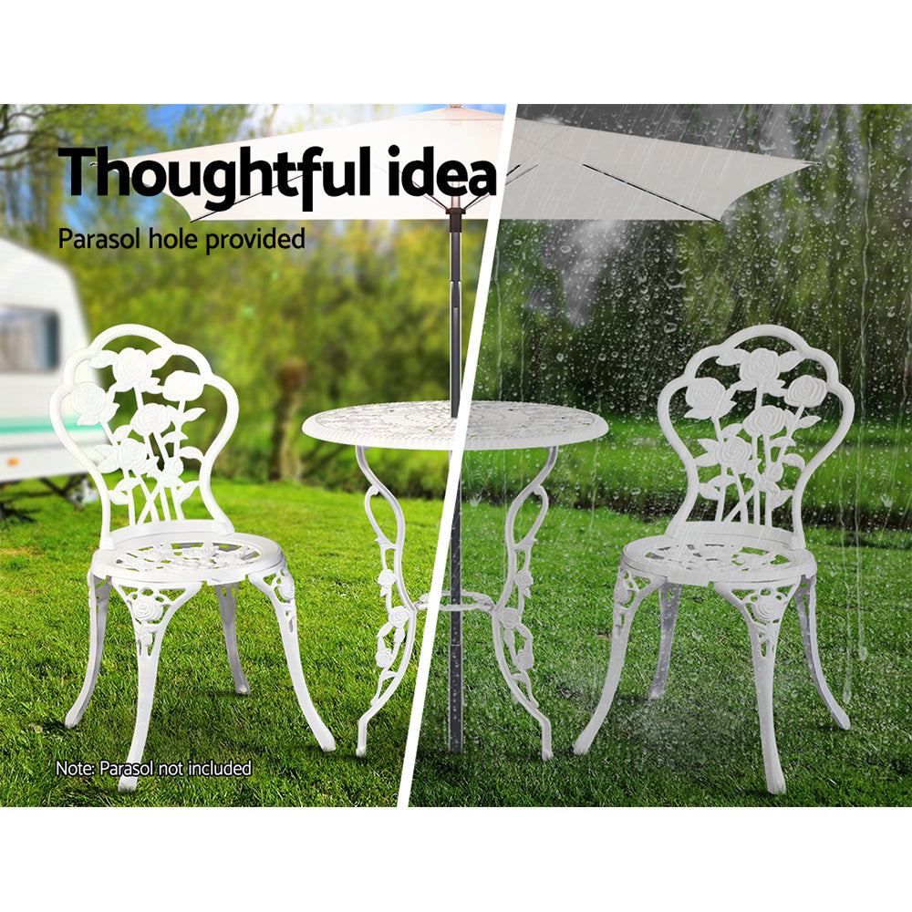 White cast-aluminum bistro set with two chairs and round table with umbrella pole