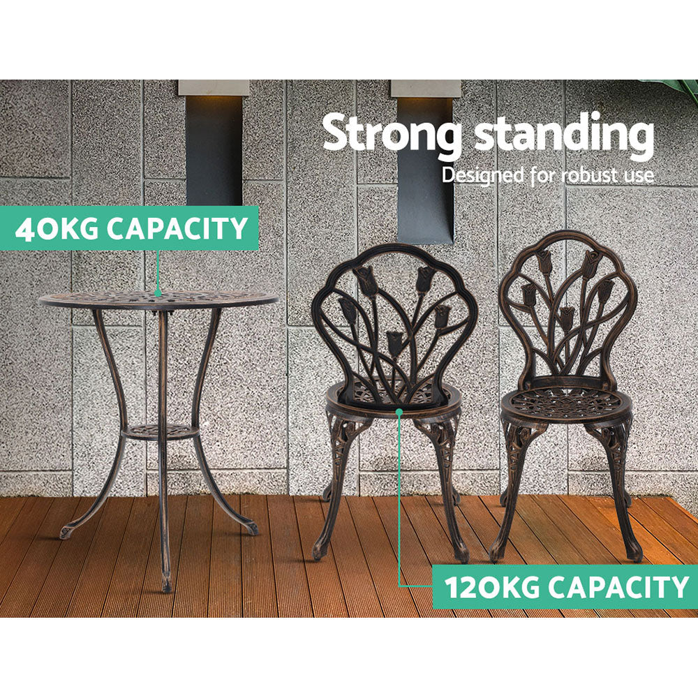 Bronze cast aluminum bistro set on wooden floor with two chairs and round table