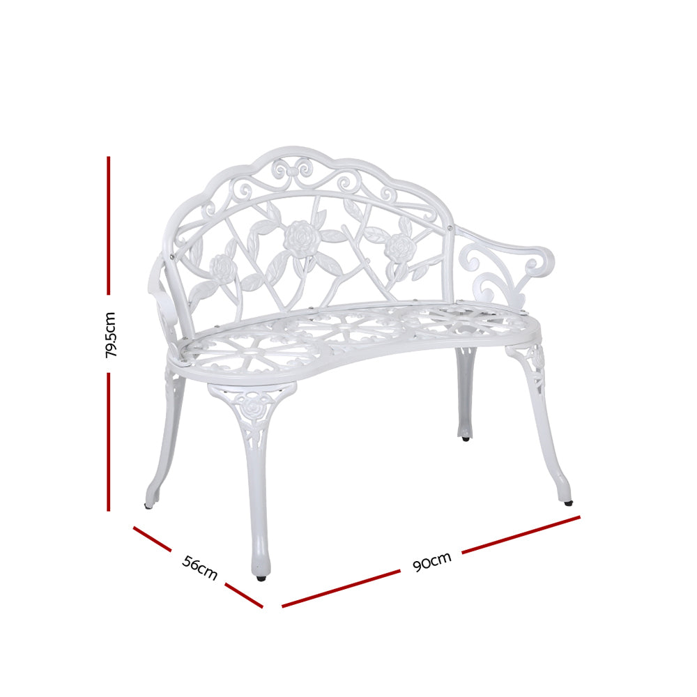 Vintage white cast aluminum bench chair with floral lattice back and curved arms