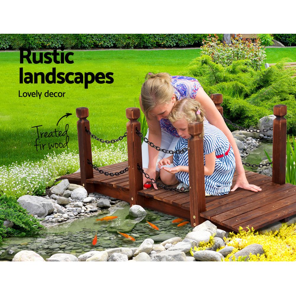 Wooden bridge garden ornament with chain railings and deck, dark brown wood