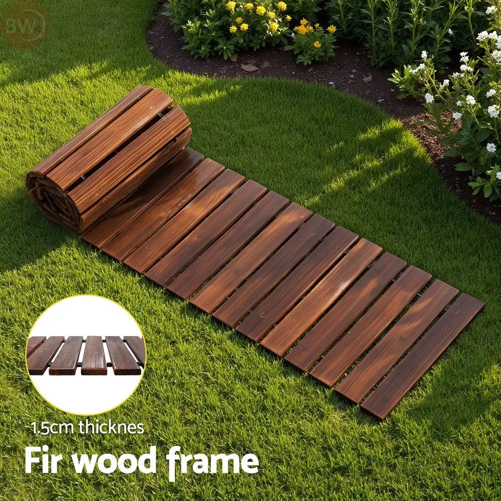 Charcoal brown fir wood framed walkway with parallel slats on green lawn
