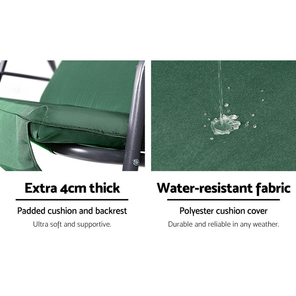 Green swing bench with padded seat and backrest, weather-resistant fabric detail