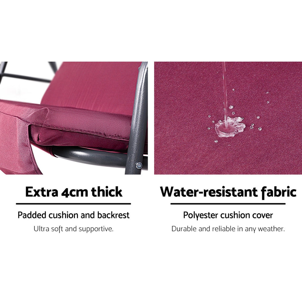 Wine red padded cushion and water-resistant fabric close-up for outdoor swing chair