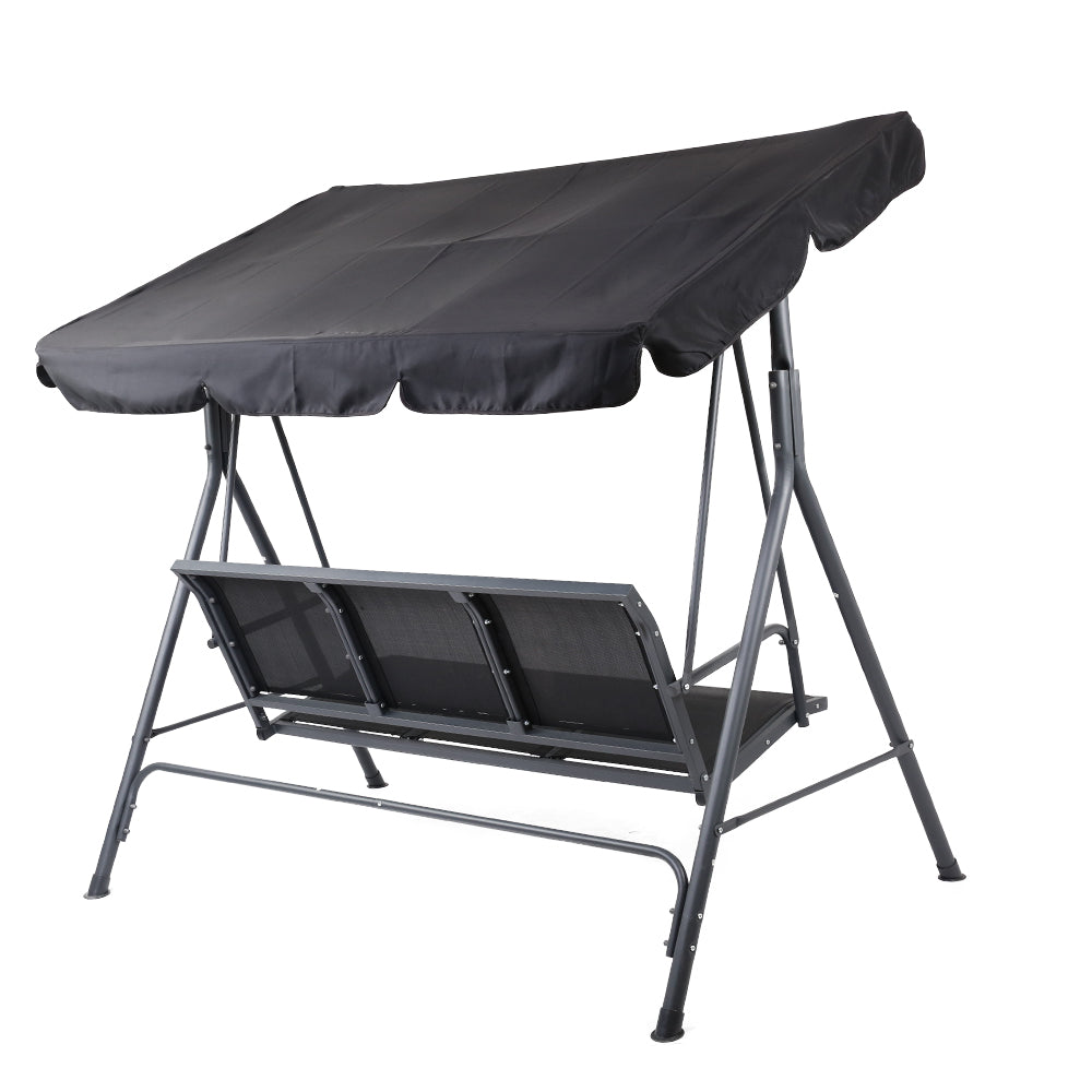 Outdoor swing chair bench with dark canopy cover and black padded seat cushion, side angled