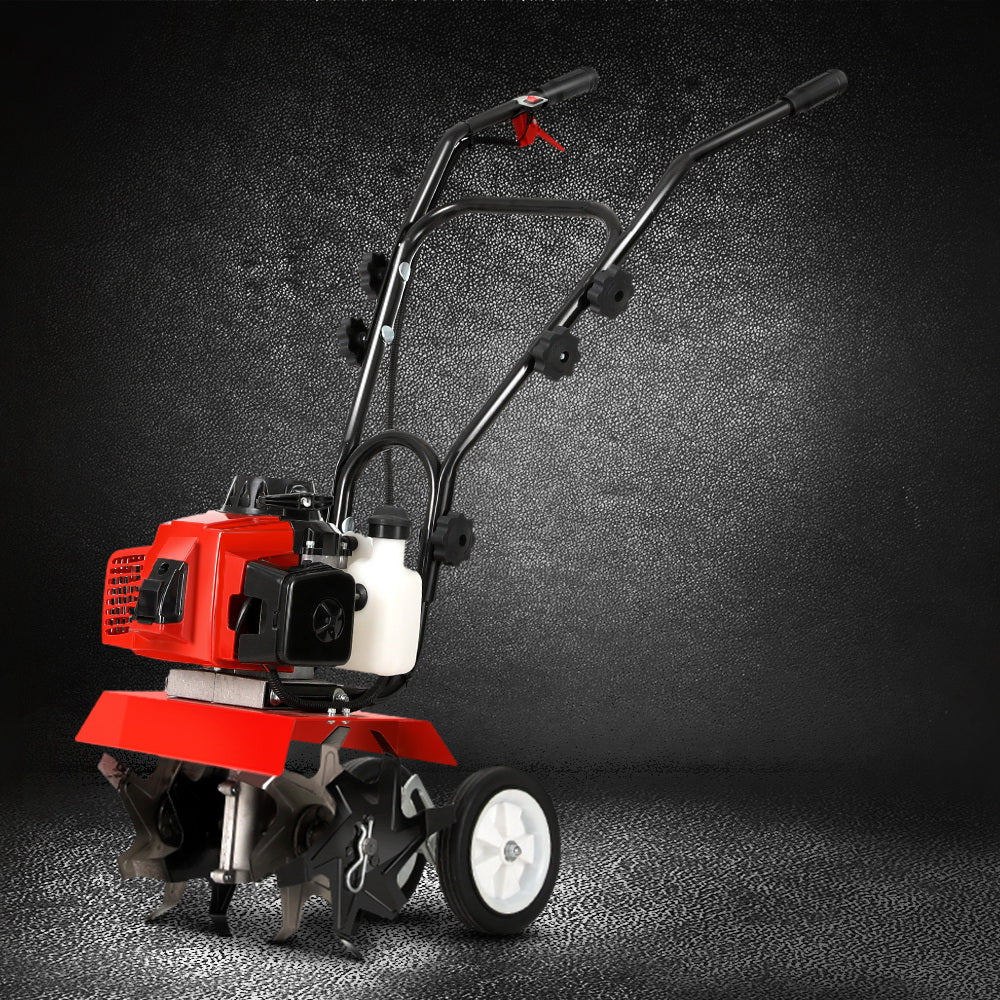 Rotary soil cultivator with red engine housing, black handlebar, and blade tines